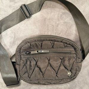 Claire's black quilted belt bag